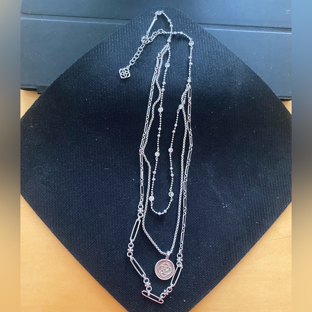 Kendra Scott three strand silver necklace.